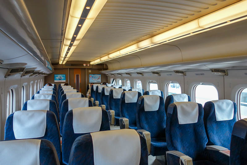 Japan-Hiroshima-Shimonoseki-Shinkansen - Todays bullet train was a different kind. Seating is 2 x 2 not 2 x 3, and its also empty apart from me.