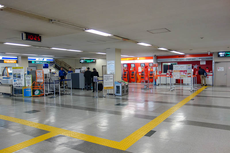 Japan 2015 - Tokyo - Nagoya - Hiroshima - Shimonoseki - Fukuoka - The Jetstar check in area, just 2 counters. They wouldnt let me check in until 2 hours before my flight. Yes I was early. So I had to wheel my bag aro