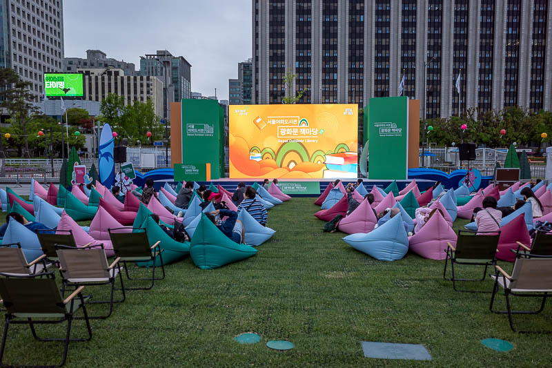 Korea-Seoul-Insadong - A lot of the outdoor library appears to be big screens and loud music. But also bean bags. Have they been checked for bed bugs? OMG!!!