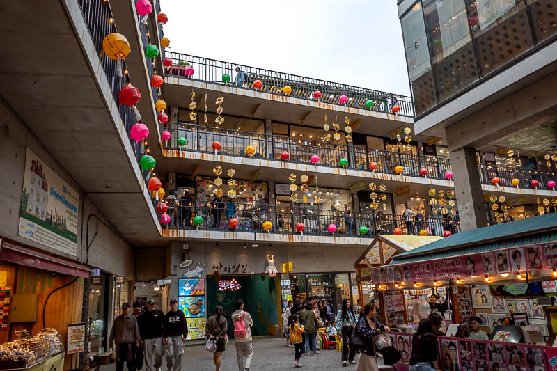Korea-Seoul-Insadong - This building with the spiral ramp is very popular for foreign tourists to buy gifts, it has been here forever. Now it has the coloured lanterns that 