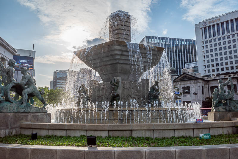 Korea-Seoul-Namsan - A fountain, water spray, sun behind it. Photo required.