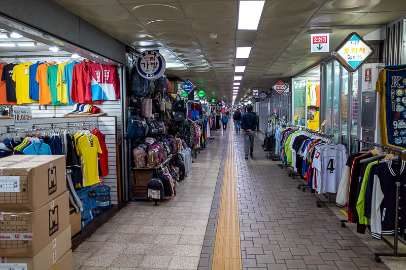 Korea-Seoul-Hyehwa-Naksan - The last section of underground is dedicated to shops full of places that make sporting clothes with your local teams logo on them.