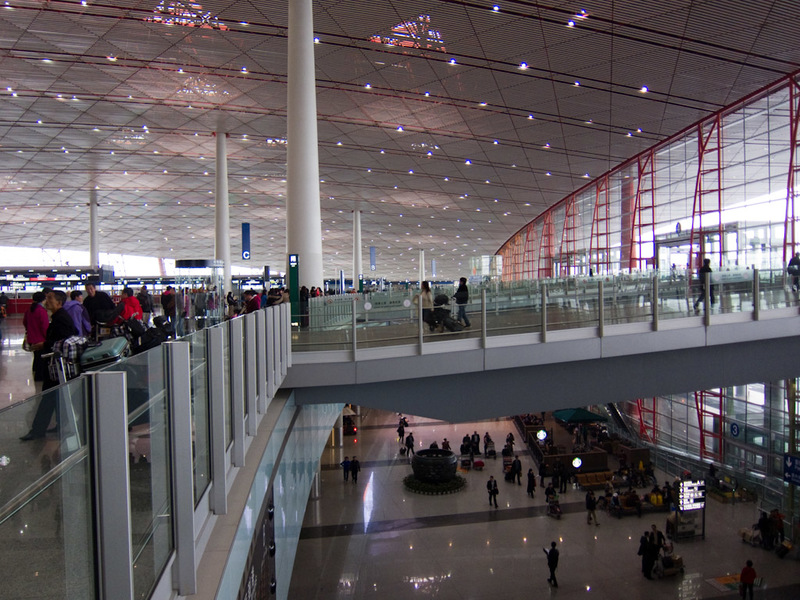 China-Beijing-Airport-Train-Lounge - Check in hall, the roof is sort of a red color.
