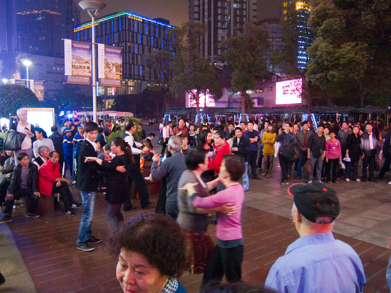 China-Shanghai-Nanjing Road-Dancing - Day ends as it begun, mass ballroom dancing.