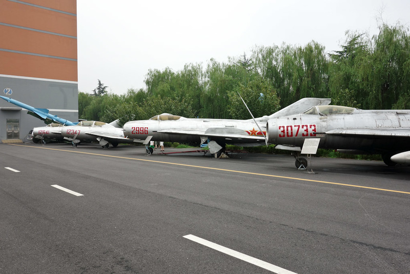 China-Shanghai-Museum-Amusement Park - The usual lineup of Korean war era mig fighters. China made them under license from Russia.