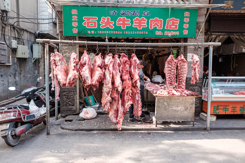 China-Xian-City Wall-Muslim Quarter - Just one of about 50 butcher shops airing their delicious meats.