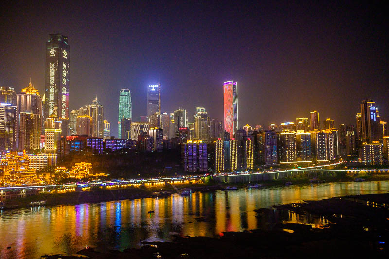 China-Chongqing-View-Hongyadong - Time to head back into town. Short exposure, hand held, therefore noisy. The bridge wasnt totally stable because trains run along underneath where I w