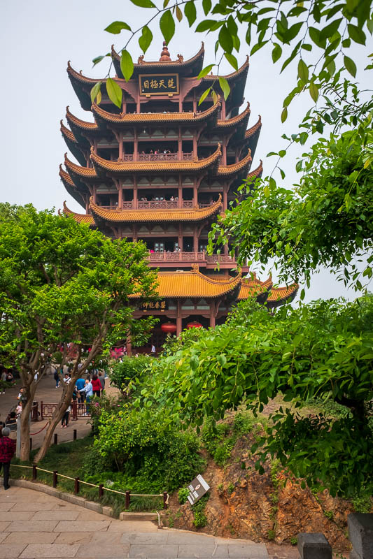 China-Wuhan-Yellow Crane Tower - Back of tower with green trees. Fog was lifting by now.
