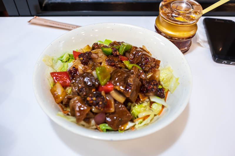 China-Hangzhou-West Lake-Temple of God - I found a popular place for dinner, sat at a bar, decided to not have beef noddle soup. This was labeled as exotic sirloin with pickled vegetables on 