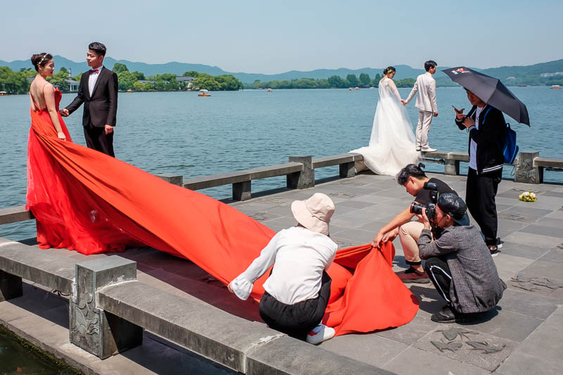 China-Hangzhou-West Lake-Hiking - Red vs White, hmm, I choose red. There were at least 10 brides to be fighting for the good spots around here.
