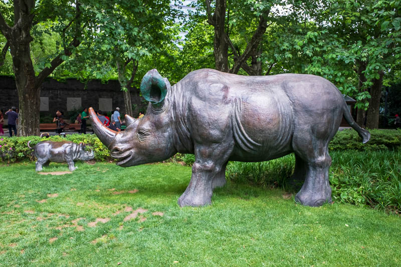 China-Shanghai-Park-Yuyuan Garden - Over the road from the golden temple is another park, where you can admire a family of petrified rhinoceroses. The grass police blew their whistle at 