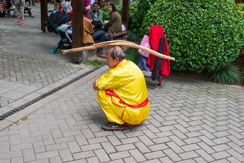 The great loop of China - April 2018 - If you get caught stepping on the sacred grass three times you are forced to put on a special yellow idiot suit and balance a stick on your head for 3