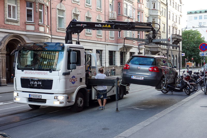London / Germany / Austria - Work & Holiday - May and June 2016 - Do not illegally park your car here. The truck pulled up, and within 30 seconds had the things under the wheels and the car in the air. I wonder what 