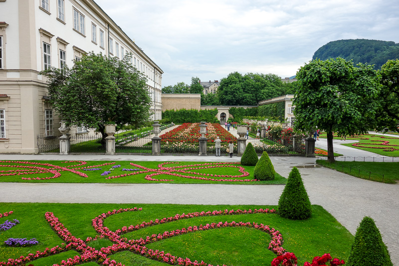 Austria-Salzburg-Mozart-Sausage - This is a sort of nice garden. Its free. Tourists enjoy it. They need to mow the lawn though.