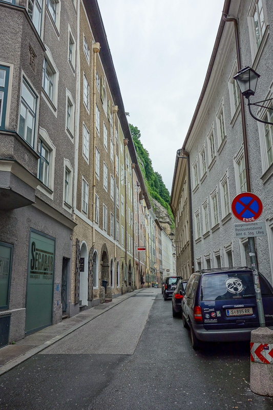 Austria-Salzburg-Mozart-Sausage - The whole left side of this skinny street is a cliff face.