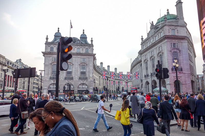 London / Germany / Austria - Work & Holiday - May and June 2016 - Picadilly circus was packed out with people watching people. The English flags are for a holiday on Monday for the Queens birthday, I think? I wont be