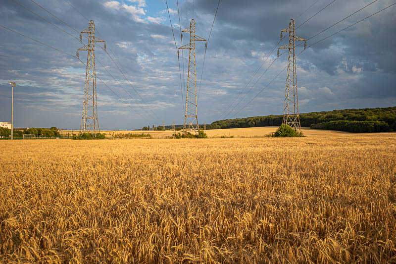 France & England... for work... - Clouds and powerlines go well with hay.