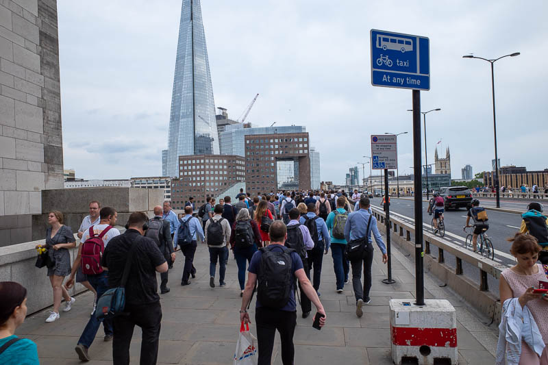 France & England... for work... - London bridge, in the news today. It has a lot of pedestrian protecting furniture now. The crowd going across here is immense.