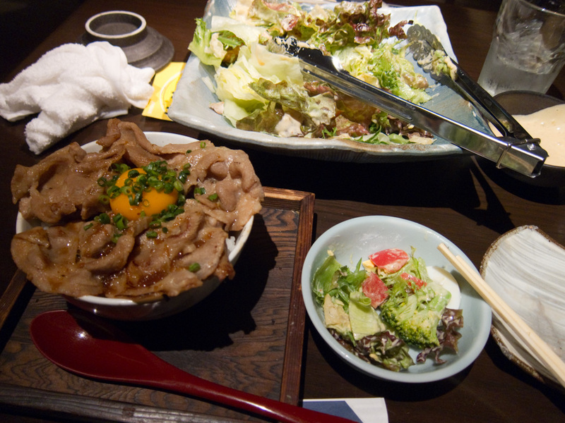 Japan-Tokyo-Shinjuku - I also got a pork bowl, which came with the standard raw egg cracked on the top. Under the pork is rice. I ate all the salad which was pretty deliciou