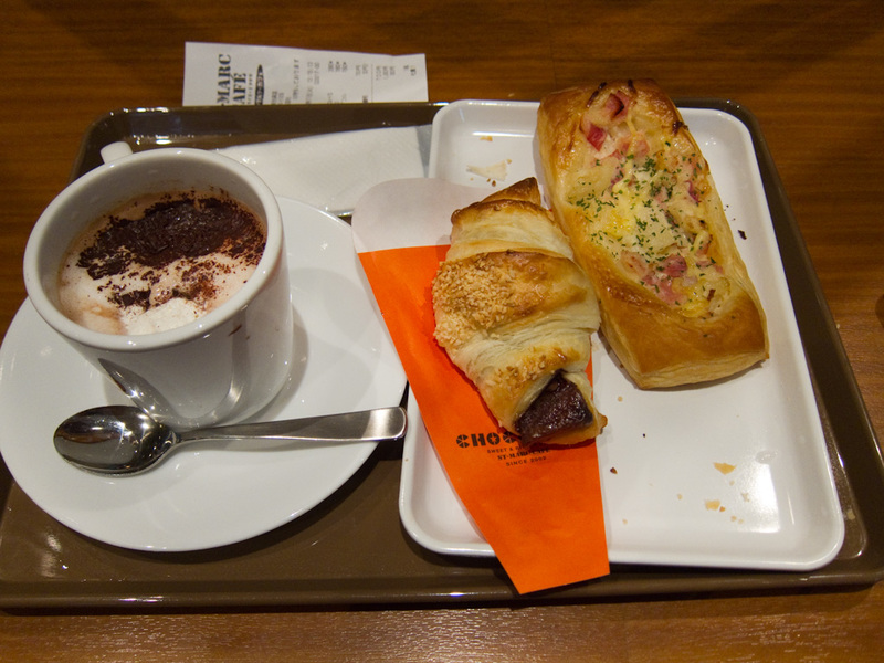 Japan-Tokyo-Museum-Cat Cafe - Heres my lunch, from Choco-something. A ham and cheese crossaint thing, a chocolate crossaint thing, and a hot chocolate. It was not great.