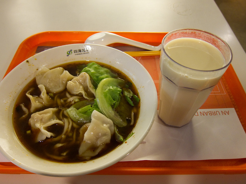 Hong Kong-Mong Kok-Sha Tin-Buddha - Pork and chicken mince dumplings in beef broth with noodles. So basically every kind of meat in one bowl. The glass contains warm soy milk which I do 