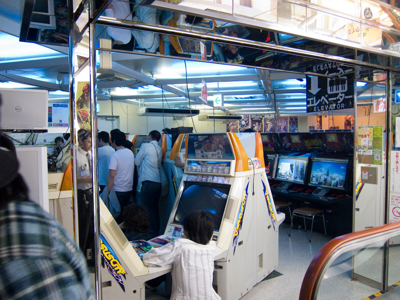 Japan-Tokyo-Akihabara-Ueno - This is inside a games parlour, one of the dirtier ones, but theres a big tournament going on. The photo dissapoints but the crowd is much bigger and 