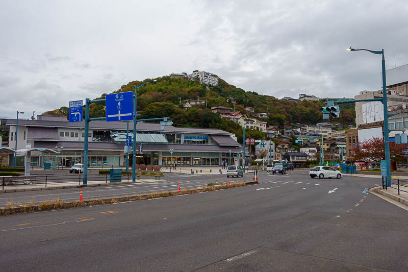Japan-Castle-Shrine-Onomichi-Fukuyama - There is Onomichi station, and the hill with the ropeway behind it, which I would soon climb up.
