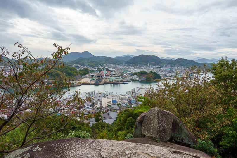 Japan-Castle-Shrine-Onomichi-Fukuyama - Time to climb the hill. It is really only about 10 minutes to the top on foot. Here is a view part way up, with a rock.