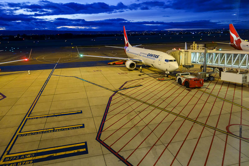 Adelaide-Brisbane-Qantas-Boeing A330 - My plane to Brisbane on the ground in Adelaide, still quite dark, but on time.