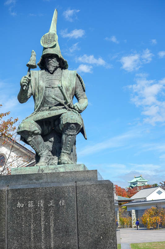 Japan-Nagoya-Castle-Curry-Flowers - This samurai guy is wearing a smurf hat and eating an ice cream. Thats worth a photo.