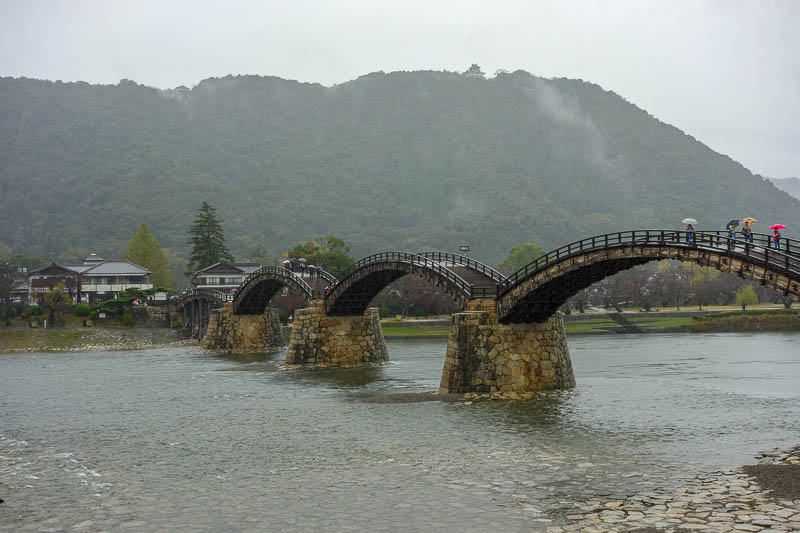 Japan-Iwakuni-Bridge-Rain-Hiking - You can just see the castle on the top of the hill behind the bridge.