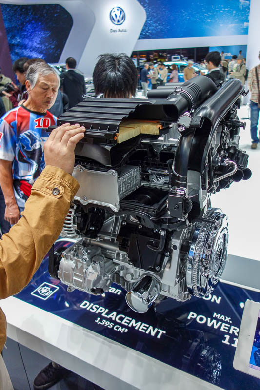 Japan-Tokyo-Odaiba-Motor Show-Ramen - Here is the downfall of the European economy. A Volkswagen diesel motor. This software debacle is the reason Germany stopped accepting Syrian refugees