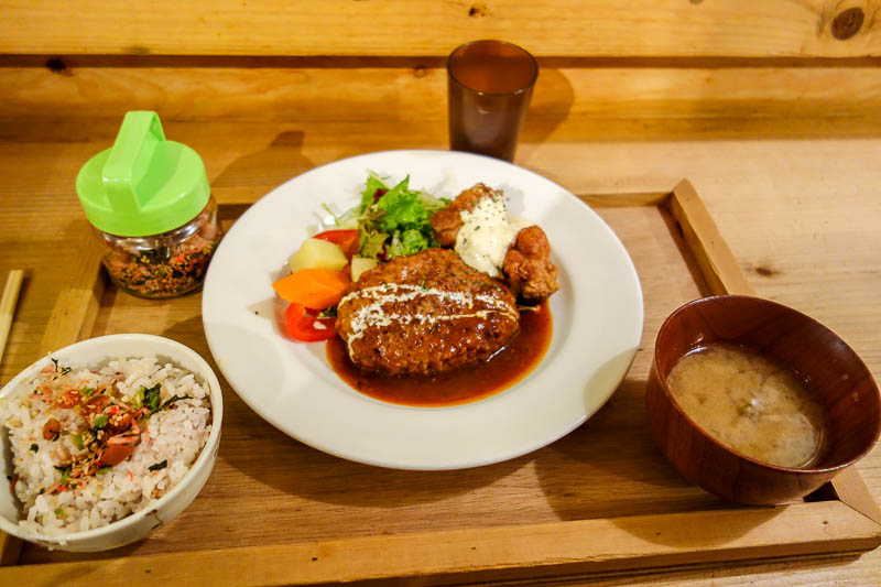 Japan 2015 - Tokyo - Nagoya - Hiroshima - Shimonoseki - Fukuoka - I had dinner early to dodge the lines. Hamburger AND deep fried crumbed pork nuggets of some kind. The stuff in the green jar is a kind of dukkah / sa