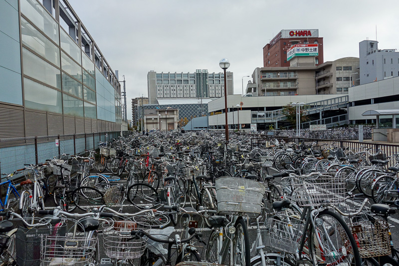 Japan-Nagano-Toyama-Shinkansen - The largest sea of bicycles I ever saw. Its early, so these people have all left for the weekend.