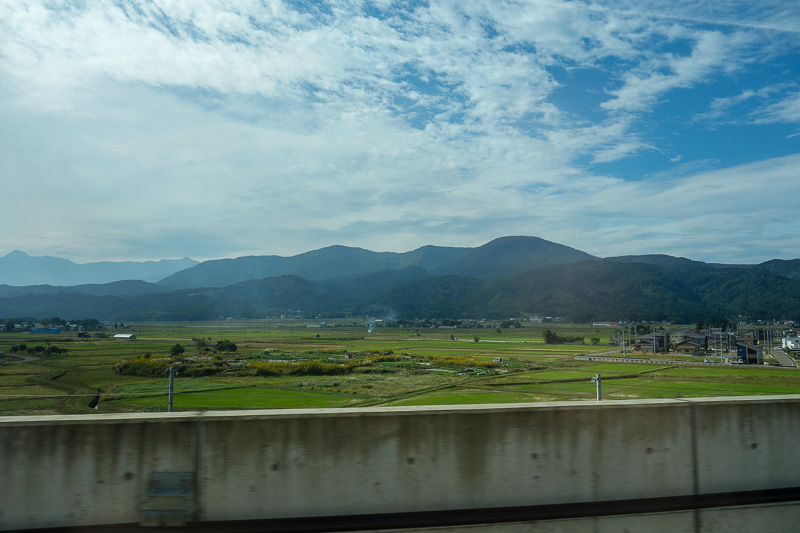 Japan-Nagano-Toyama-Shinkansen - Here is a shot I managed to snap from the train one of the few moments it was not in a tunnel. Nice smoke.