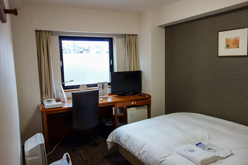 Japan-Nagano-Toyama-Shinkansen - This is my huge hotel room. I am taking ballroom dancing lessons from the tv right now.