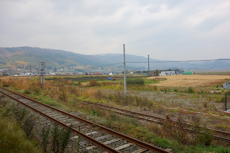 Visiting 9 cities in Japan - Oct and Nov 2016 - Shin Hakodate station, it really is in a farmers field, nice view though.