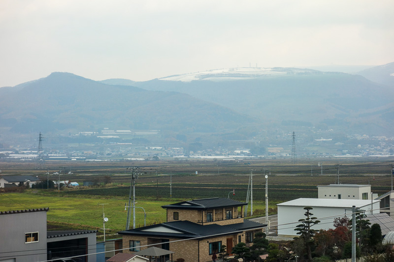 Visiting 9 cities in Japan - Oct and Nov 2016 - And from the bullet train level you can see some ice on top of the hill. That ice was not there when I arrived here a couple of days prior.