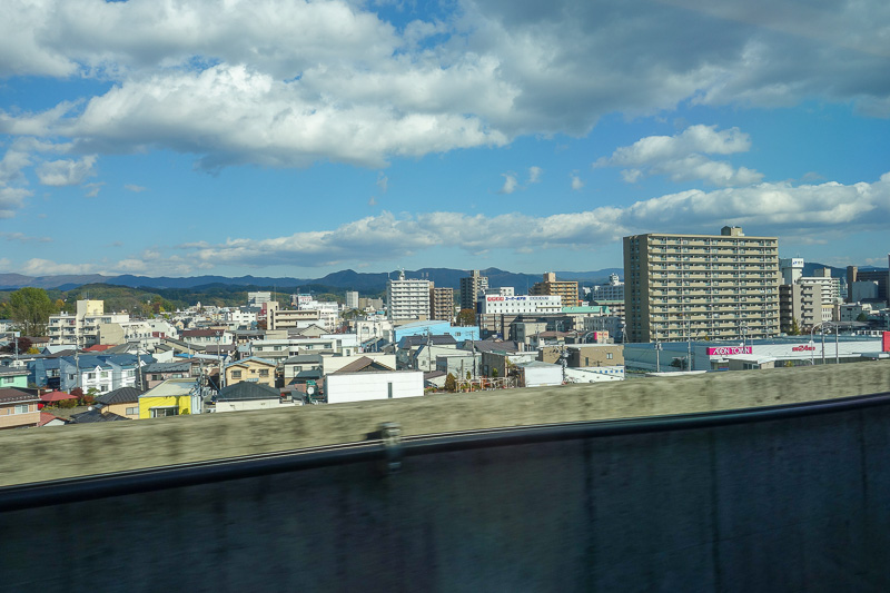 Visiting 9 cities in Japan - Oct and Nov 2016 - One of two major cities along the way is Morioka, the platform is elevated so there is a view, I celebrated with a photo.