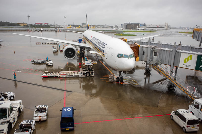 Japan-Tokyo-Narita-Singapore Airlines - Here is my childless 777, after the earlier flight, the plane of my dreams. As you can see, its pouring massive amounts of rain. The same thing happen