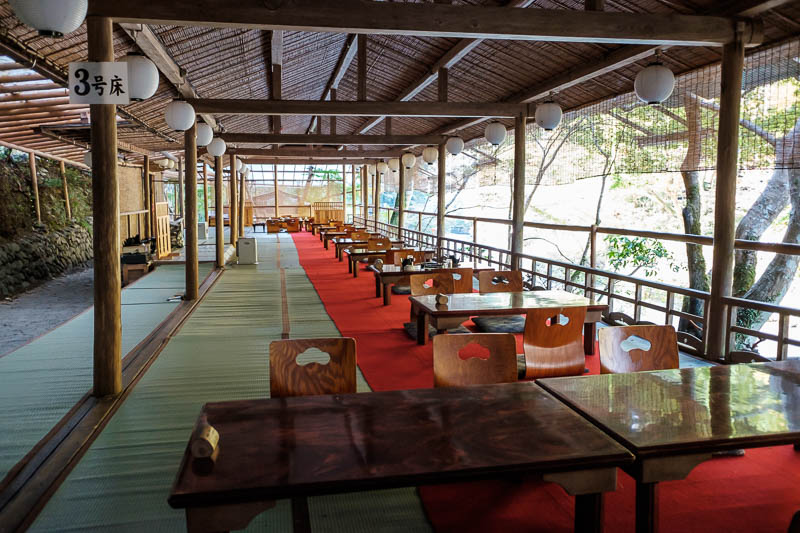 Japan-Kyoto-Hiking-Mount Atago-Arashiyama - Instead of the trail, its a big open air restaurant. There is without exaggeration about 100 metres of seating like this along the cliff.