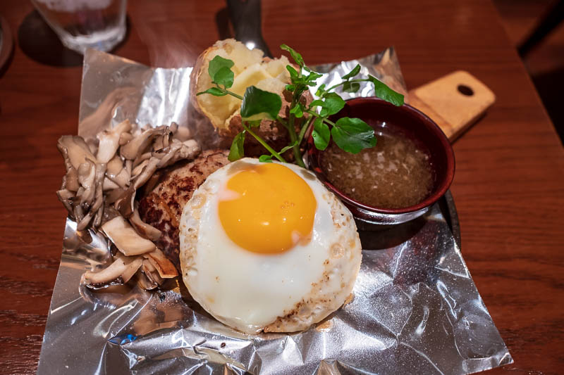 Japan-Osaka-Umeda-Mall-Food - And finally, my dinner, which is a hamburger steak on top of a couple of vegetables, with Japanese style mystery sauce, an egg, mushrooms and a baked 