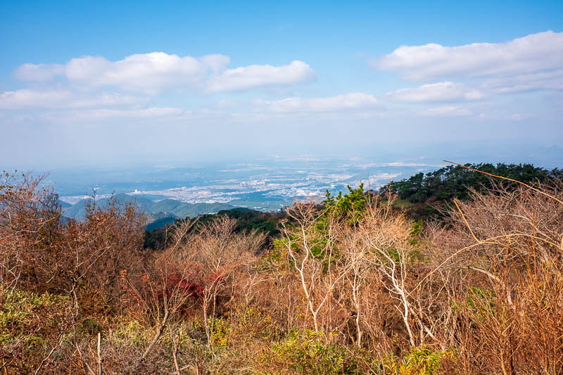 Japan-Kobe-Hiking-Mount Rokko - The far side of the mountain is more cities. Nishinomiya apparently. Never heard of it. A guy taking the same photo pointed and said that to me, I che