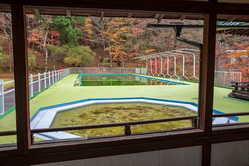 Back to Japan for even more - Oct and Nov 2017 - The path then descended into the back of a resort, closed obviously, as you can see their pool is bright green. The signs pointing to the exit all lea