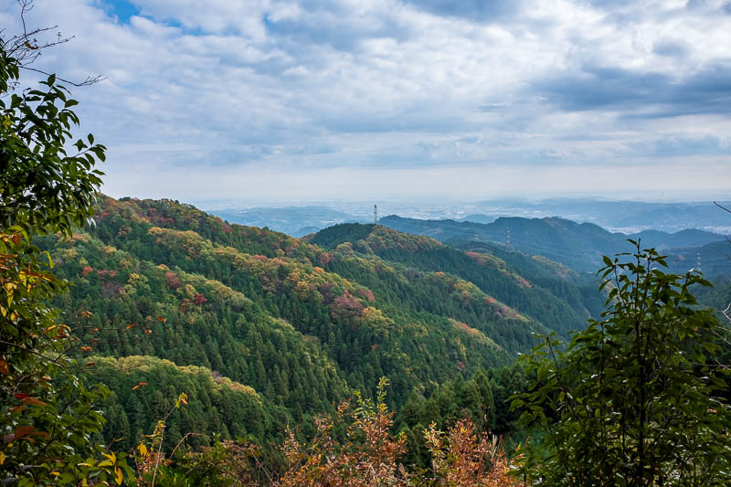 Japan-Hiking-Asoyama-Hinodesan-Mitake - There was quite a lot of logging in this area, and I could hear chainsaws. Logged areas provided an opportunity for a view. Thats Tokyo in the distanc