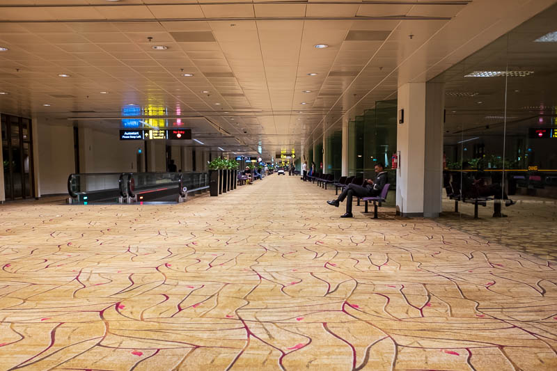 Melbourne-Singapore - Part of my epic 10km walk around Singapore airport. A sea of carpet.