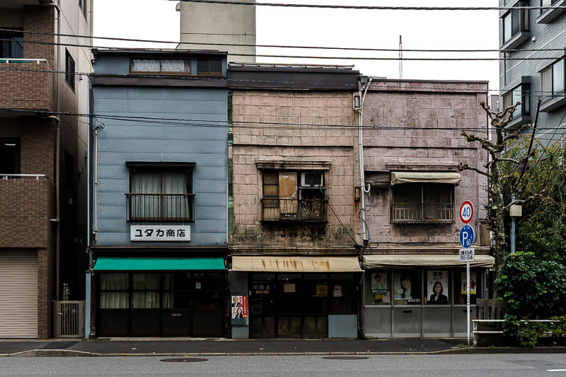 Of course I am back in Japan yet again - Oct and Nov 2018 - On my return journey I spotted these spooky old houses looking out of place in the street. I thought they summed up todays weather quite well.
