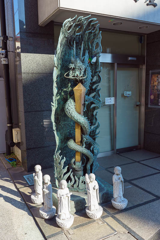 Of course I am back in Japan yet again - Oct and Nov 2018 - Just a random dragon wrapped around a sword protected by 5 Buddha statues on a street corner.