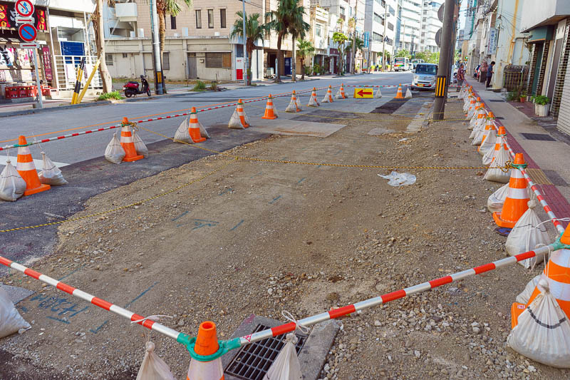 Japan-Okinawa-Naha-Navy - I was amused that not only have the orange cones and barriers been erected around these road works, but some rope has been strung across the area as w