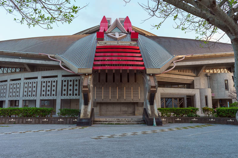 Japan-Okinawa-Naha-Food - Over the road from the military base is this theater shaped like a samurai helmet. I believe every Japanese city has one the same. Inside they mainly 